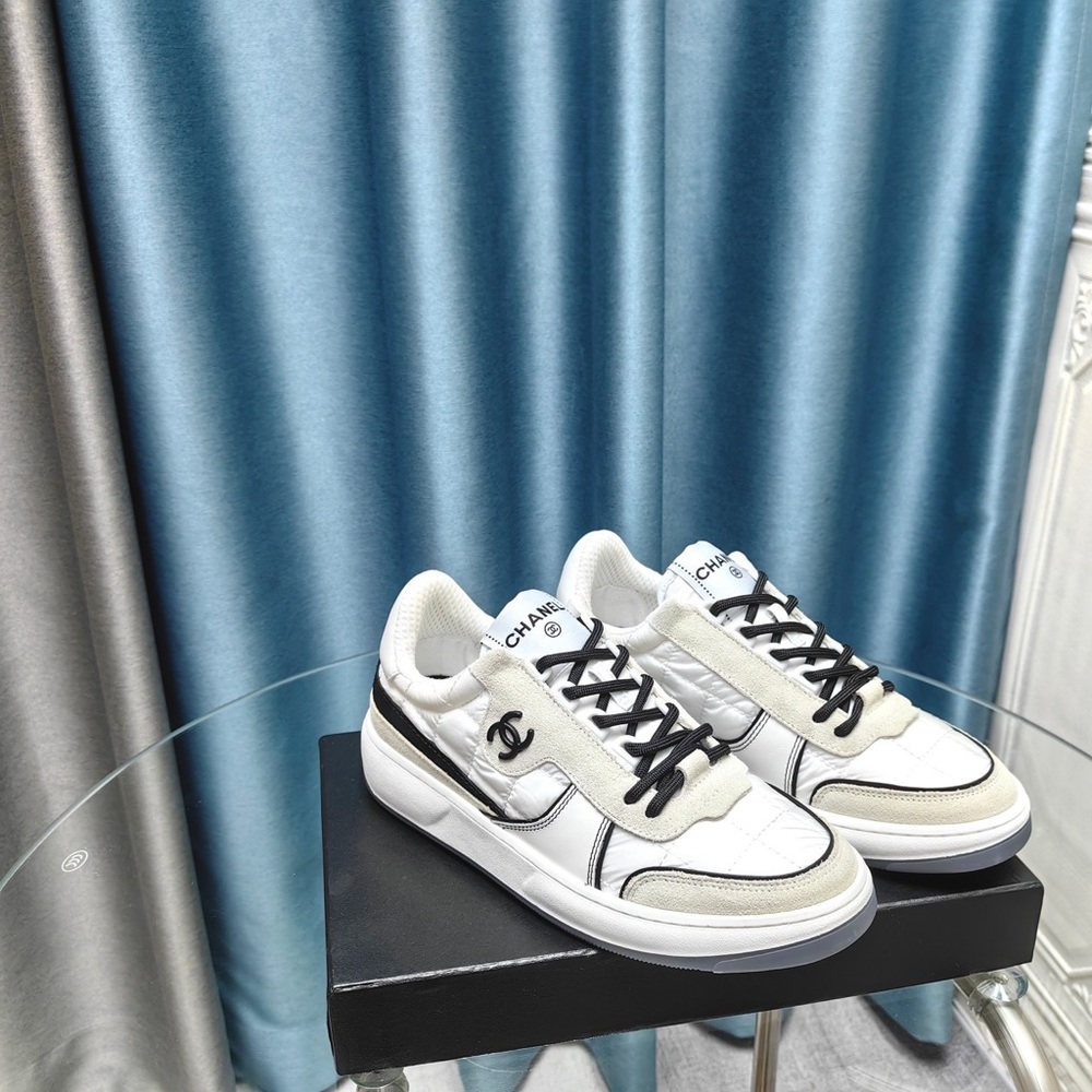 CHANEL Women’s Black and White Casual Sneakers - Picture 4 of 9